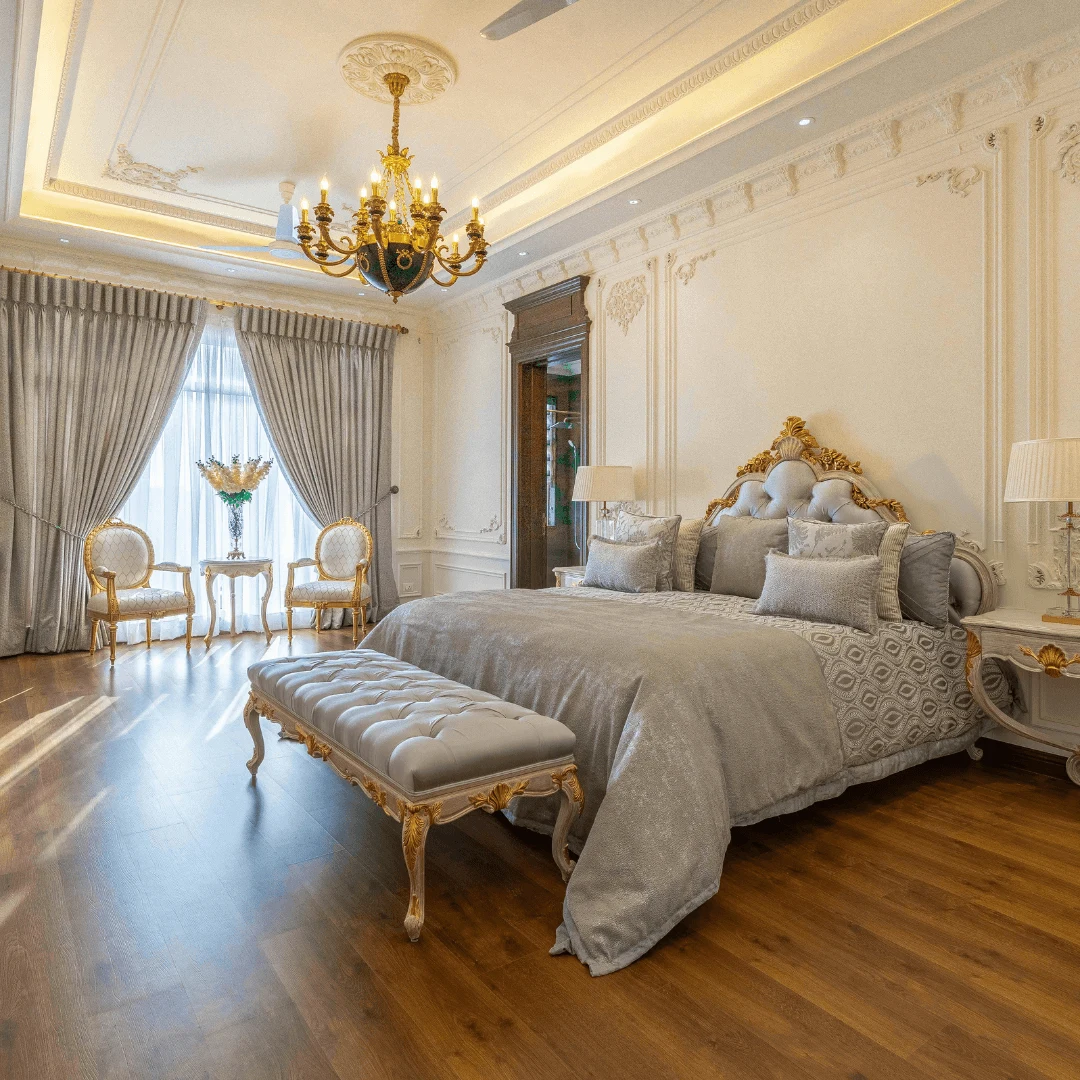 Trendy Bedroom Design with Marble Wall Panel and Wooden Bedframe.